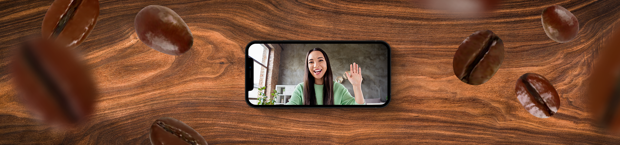 phone on table with coffee beans