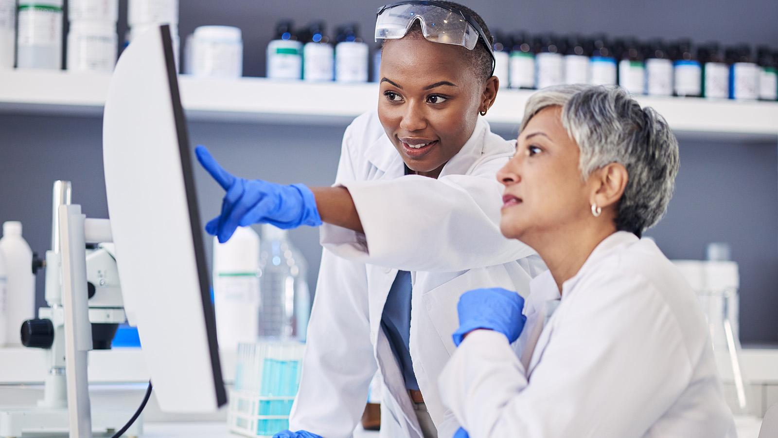 colleagues working in a chemical laboratory