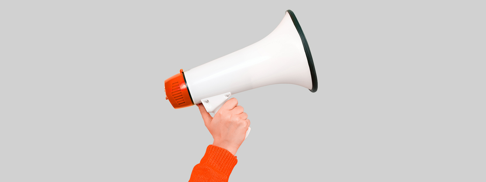 Hand mit Megafon