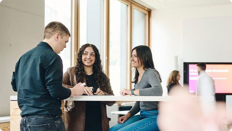 People at work in an W&W office