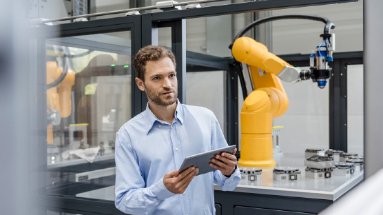 photo of a man in hi-tech manufacturing environment