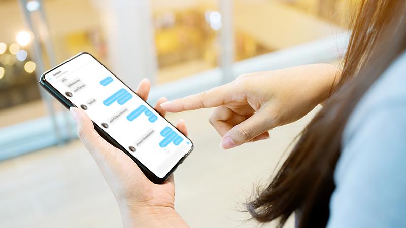 woman using smartphone chat