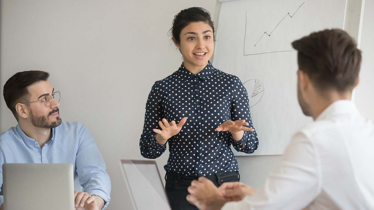 Young woman presenting facts for Salessomething