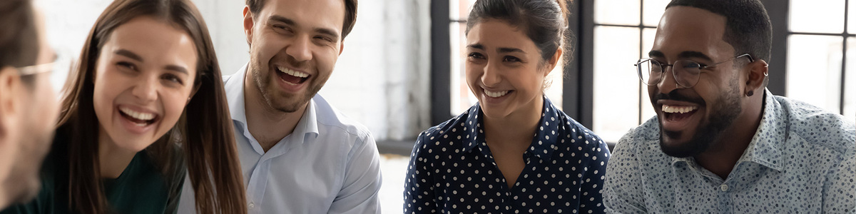group of employees laughing