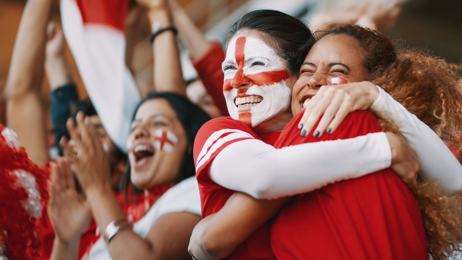 sport fans celebrating in the arena