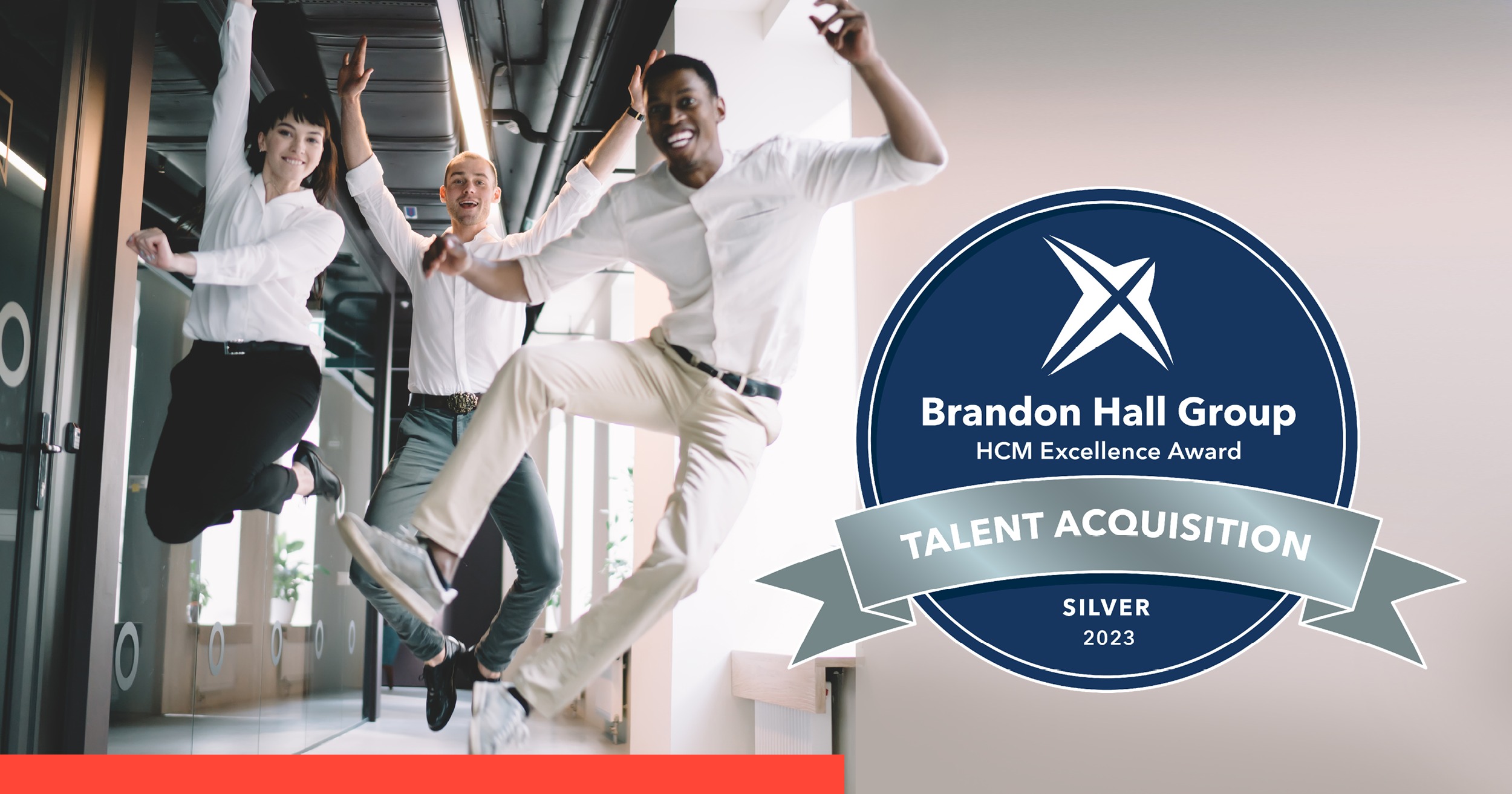 Person jumping to celebrate Brandon Hall 2023 Silver Award