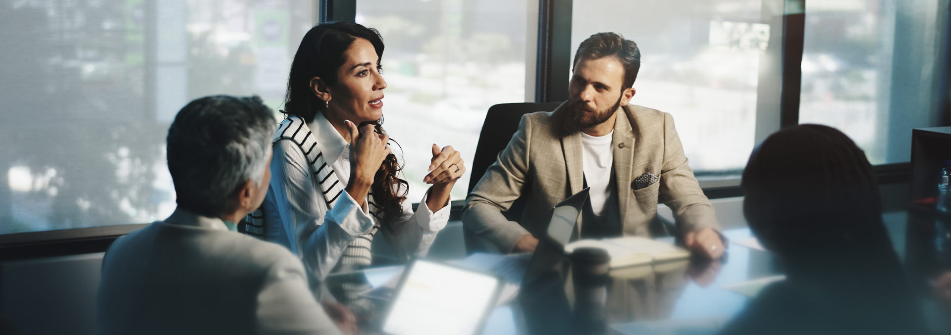 People in discussion in a boardroom