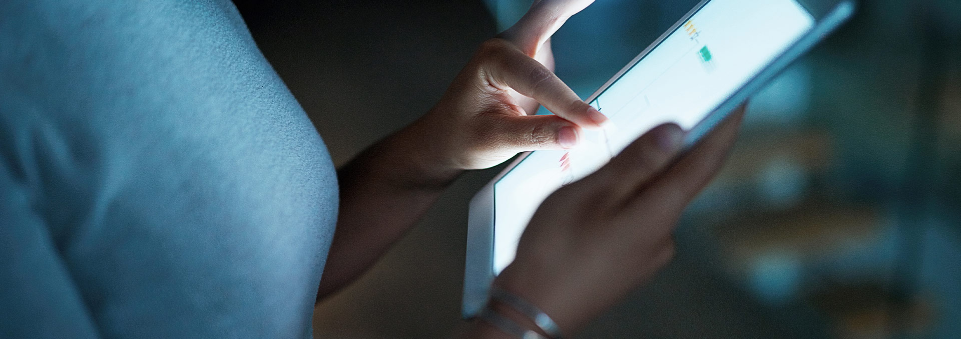 Person viewing performance on a tablet