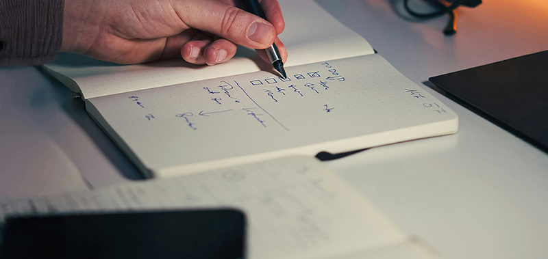 Skills Checklist being taken down in a notebook